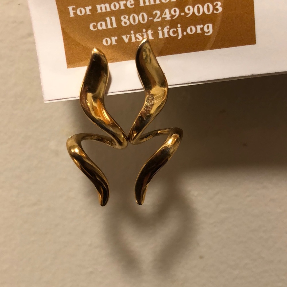 A pair of drop earrings that make any outfit a little more “ stylish”